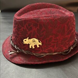 Burgundy Fedora with a faux leather band.